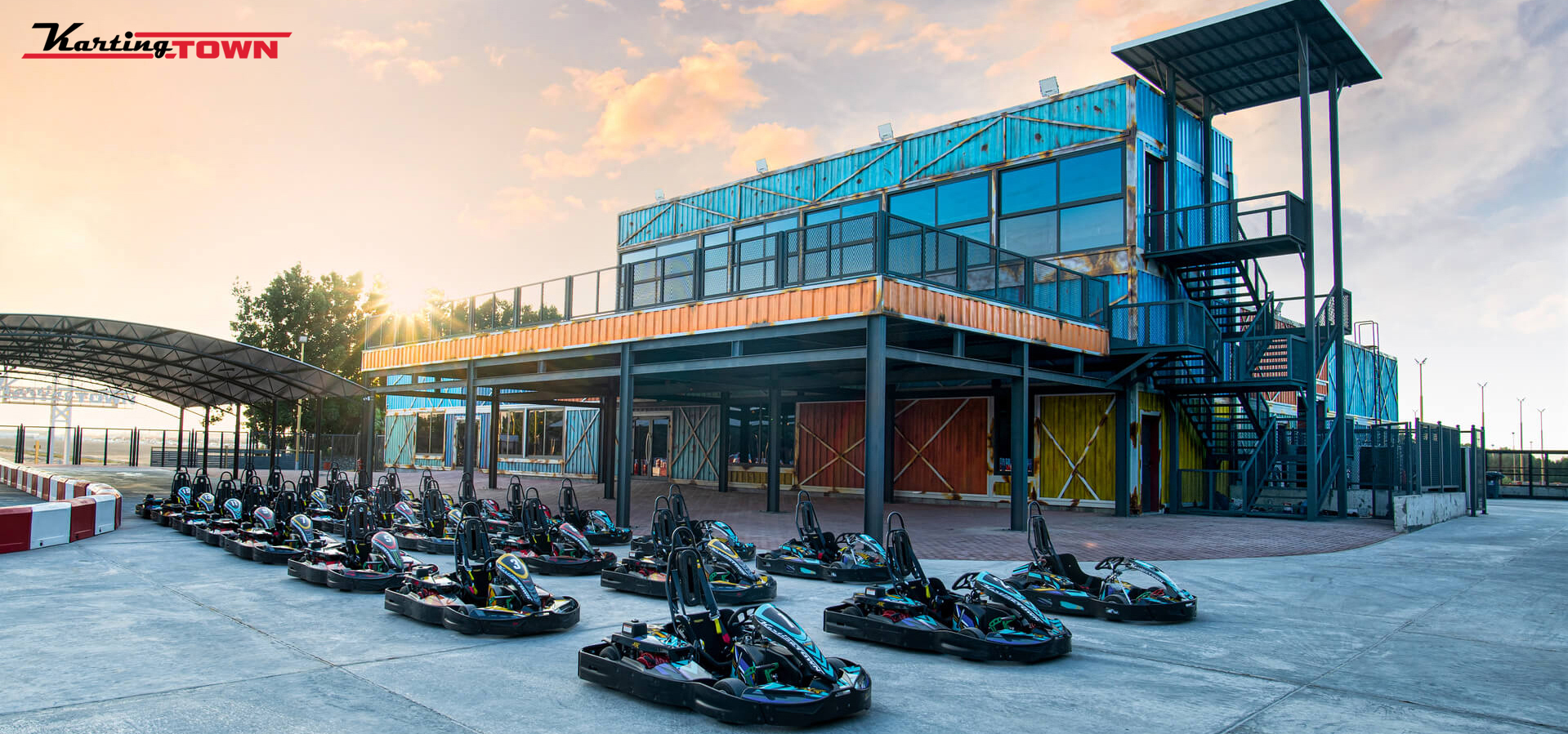 A traditional wooden boat carrying passengers on calm blue waters under a clear sky in Musandam 