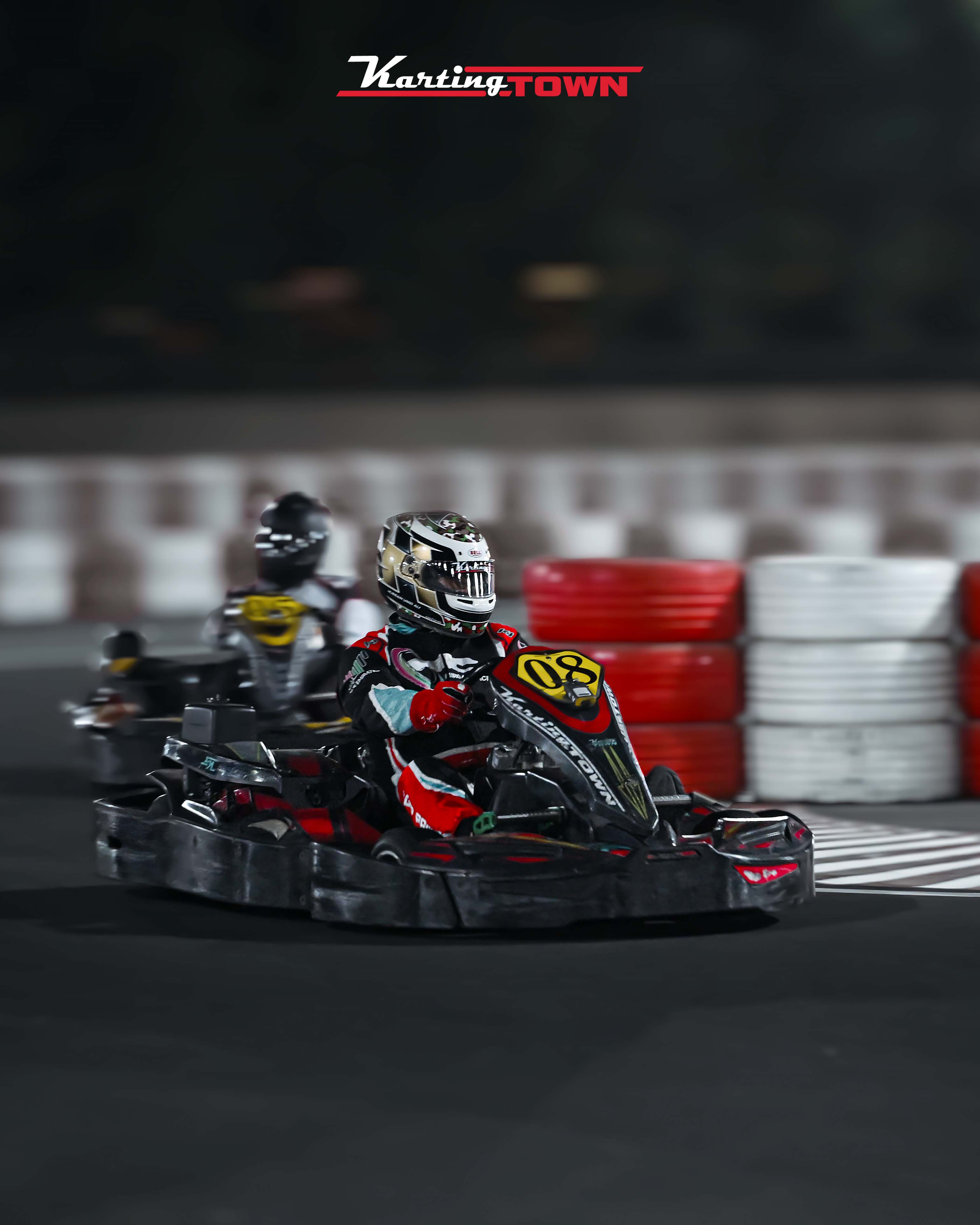A traditional wooden boat carrying passengers on calm blue waters under a clear sky in Musandam 