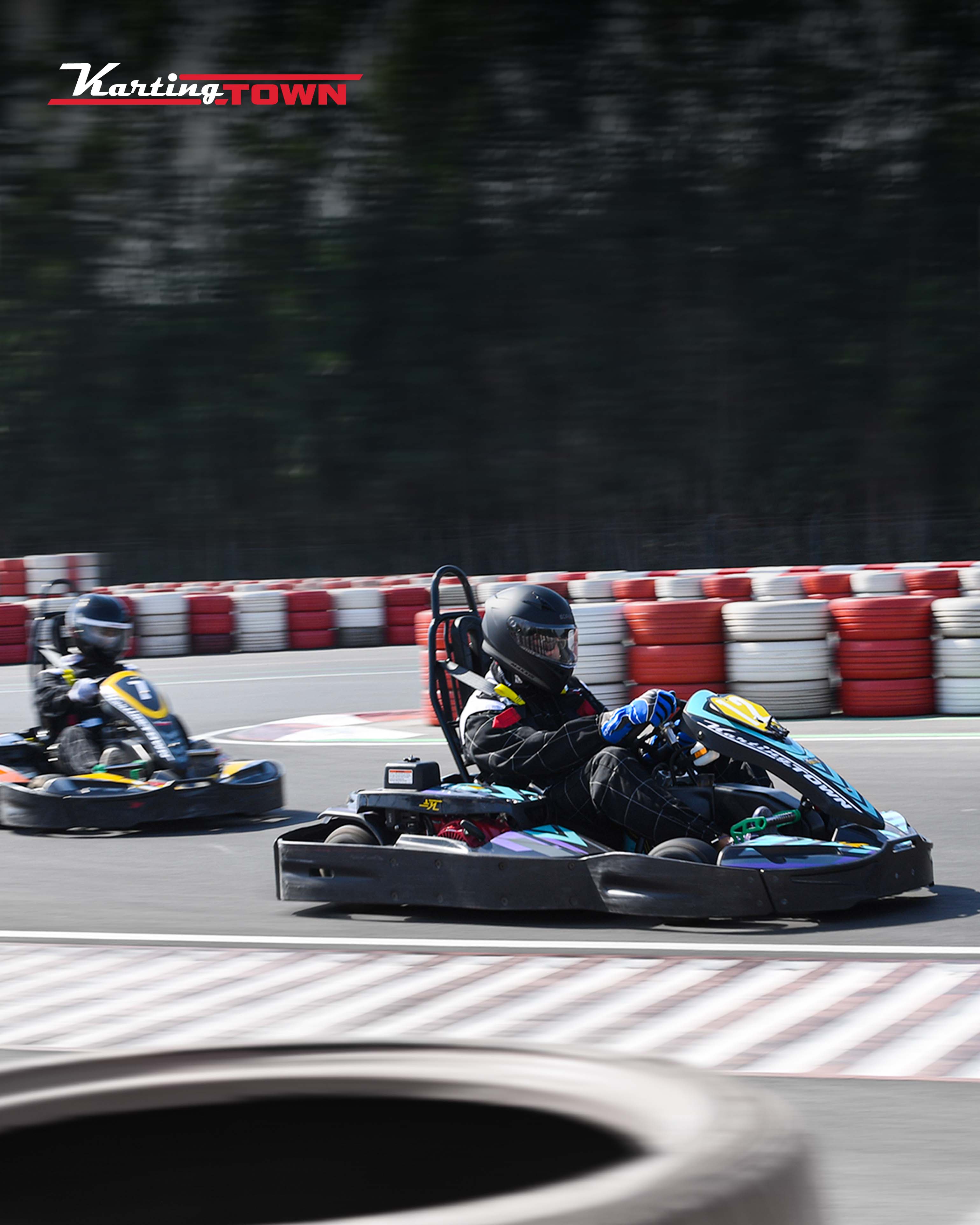 A traditional wooden boat carrying passengers on calm blue waters under a clear sky in Musandam 