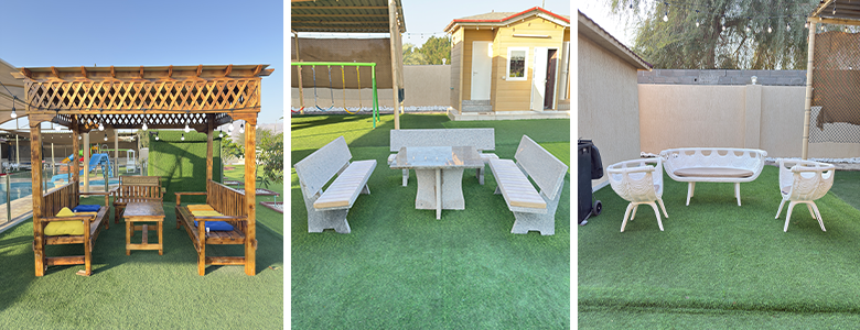 A traditional wooden boat carrying passengers on calm blue waters under a clear sky in Musandam 