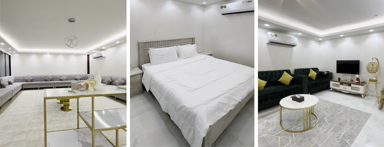 A traditional wooden boat carrying passengers on calm blue waters under a clear sky in Musandam 